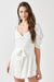 Pleated Puff Sleeve Overwrap Romper - KOKOTETE