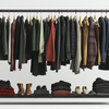 A stylish rack of clothing with Black Friday apparel deals.